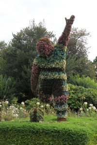 Rugby player statue in flowers